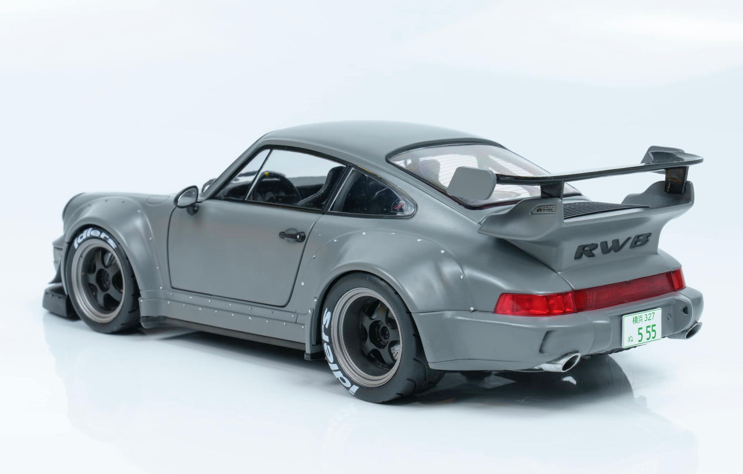 1/18 SOLIDO – Die-Cast PORSCHE 911 964 RWB BODYKIT NARDO GREY 2024 WITH AKIRI NAKAI FIGURE IN CHAIR – LIMITED EDITION