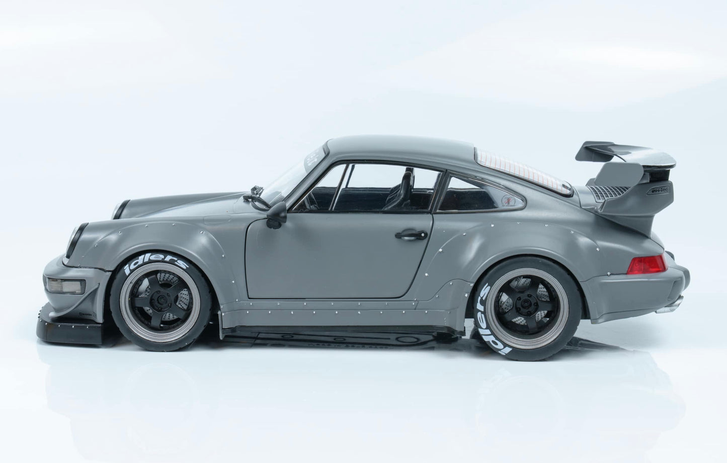 1/18 SOLIDO – Die-Cast PORSCHE 911 964 RWB BODYKIT NARDO GREY 2024 WITH AKIRI NAKAI FIGURE IN CHAIR – LIMITED EDITION